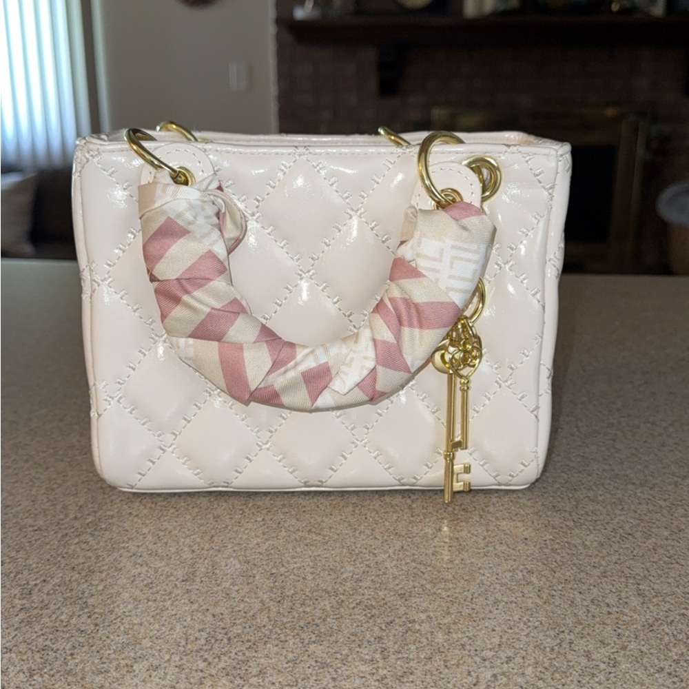 Elegant Cream Quilted Handbag with Pink Accents